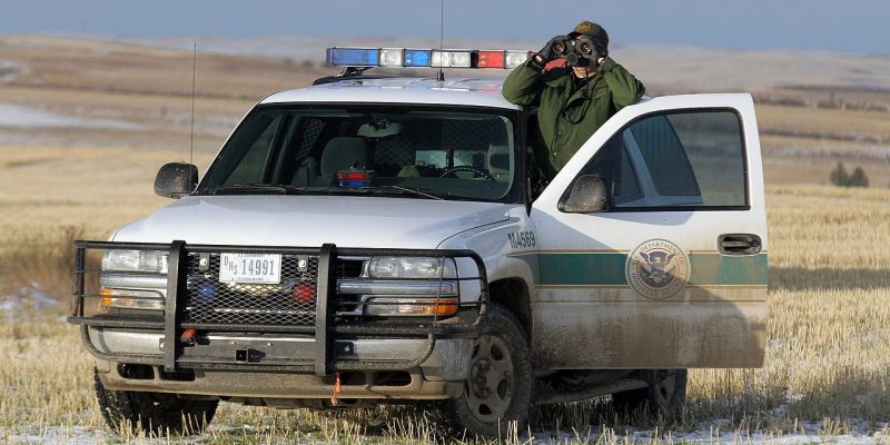 CBP Border Patrol agent monitors US/Canadian border near Sweet Grass Montana.